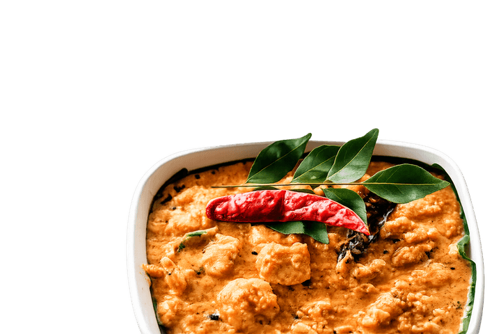 A vegetable curry finished with curry leaves and red chilli